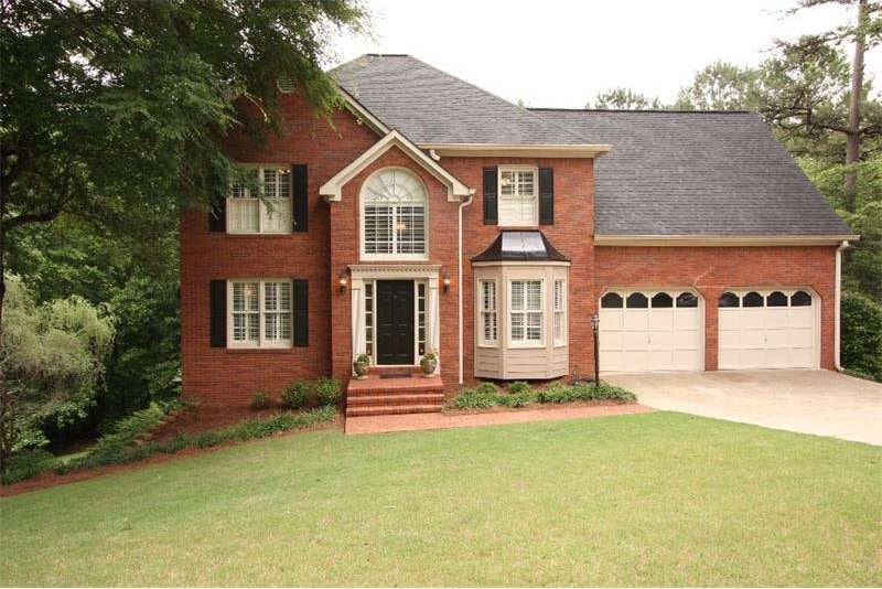 Brick front and cement siding - and notice 