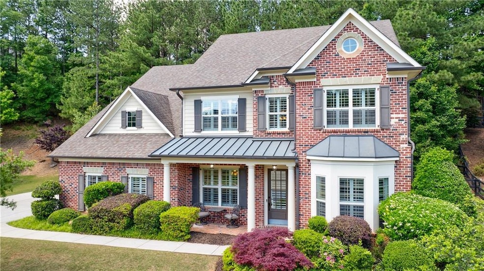Craftsman house with brick siding, roof with shing