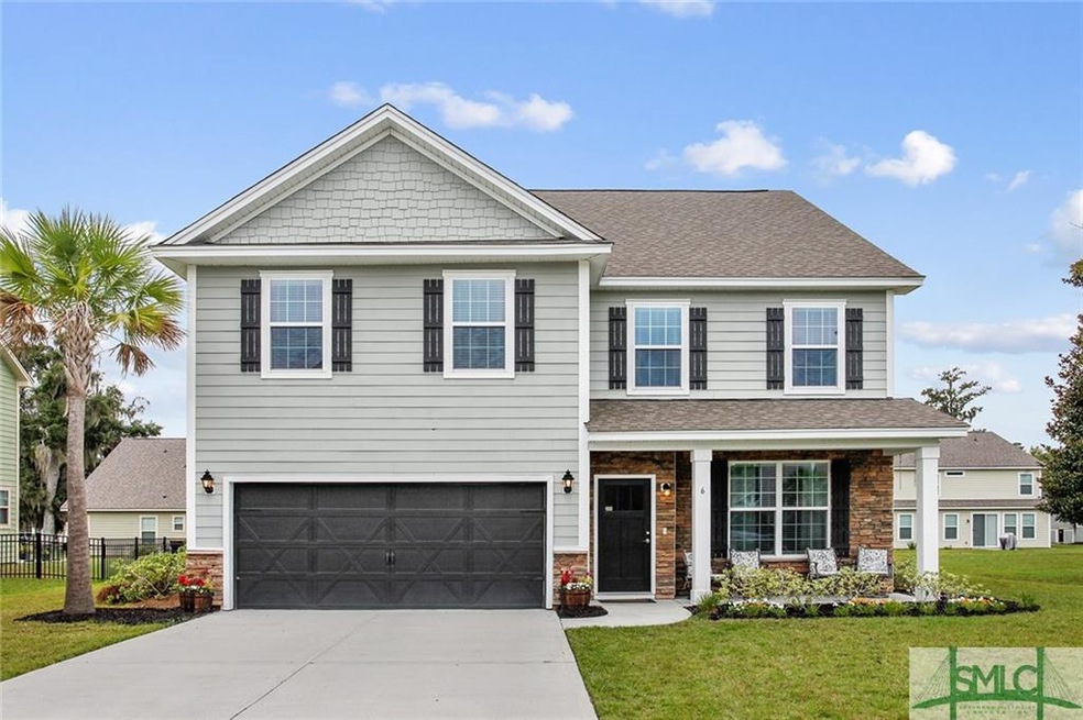 Front Exterior with 2 car garage...only 2 short bl