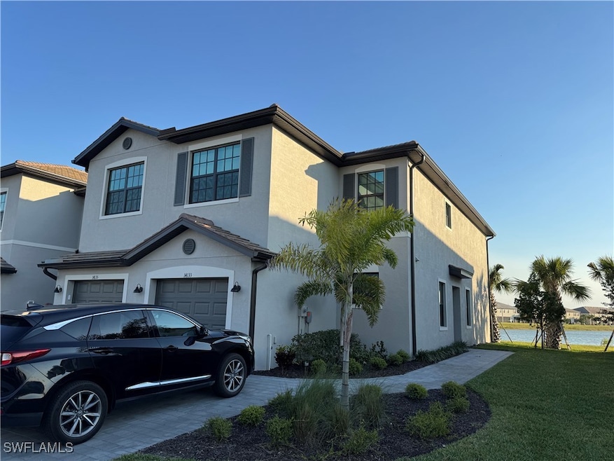 View of front of property featuring stucco siding,