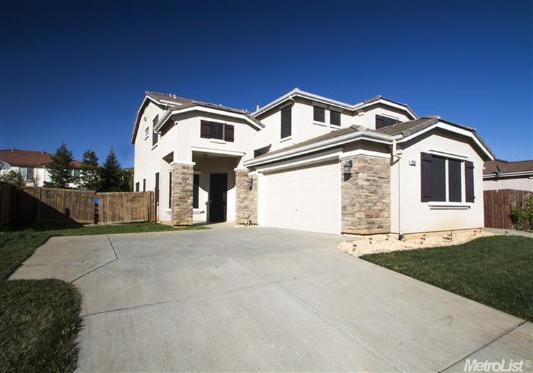 Extra large lot with RV access and large garage!