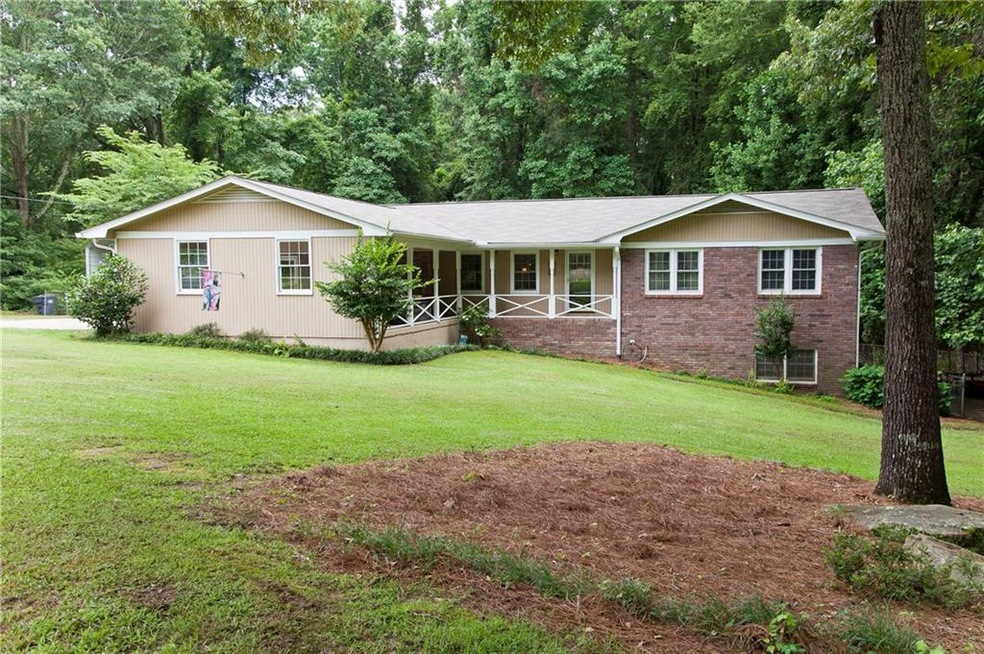 All brick home with added, 2 cars car-port located