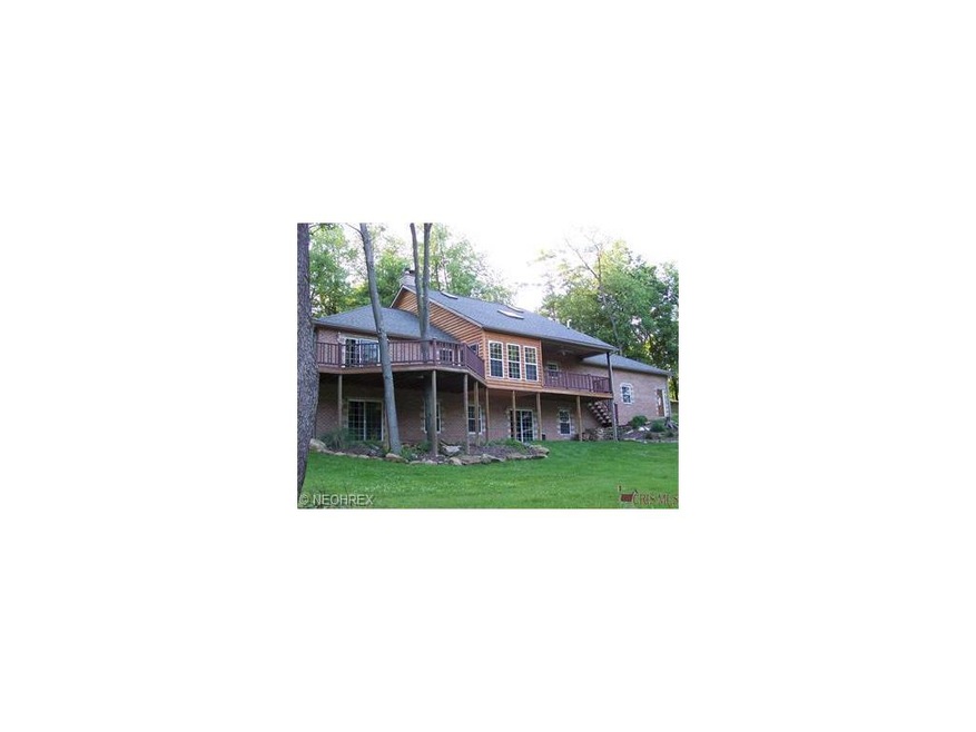 Rear, the large deck out the master, tree through 