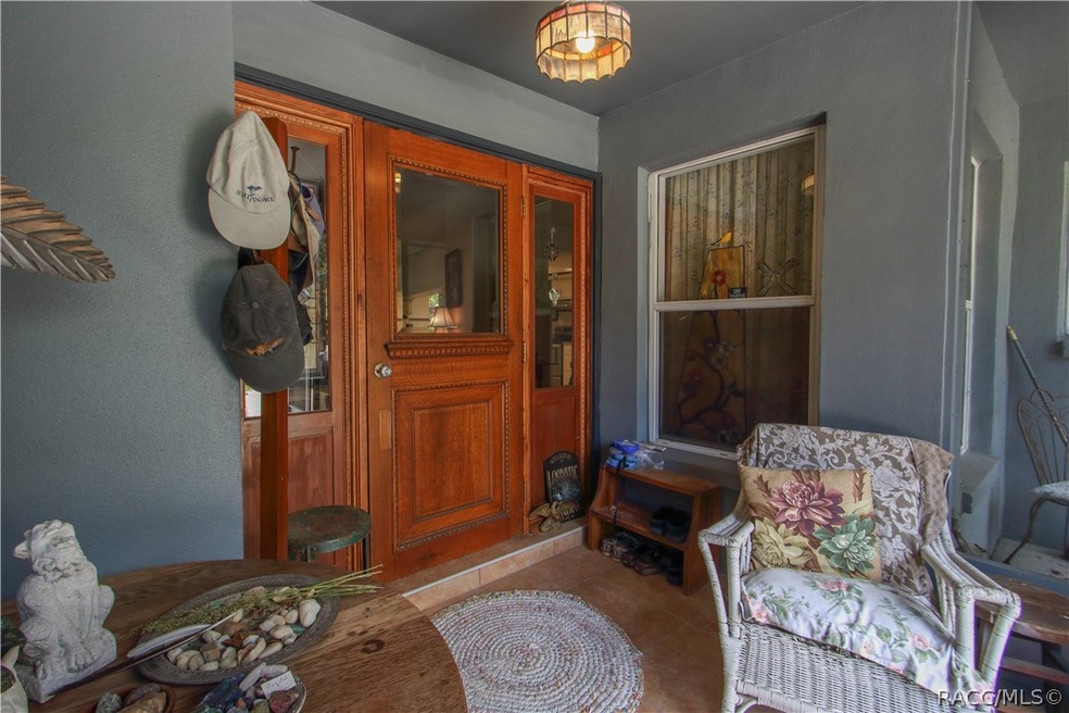 Enclosed front porch.