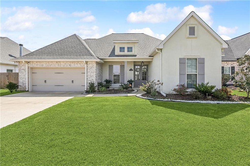 Stunning curb appeal with 2 car attached garage