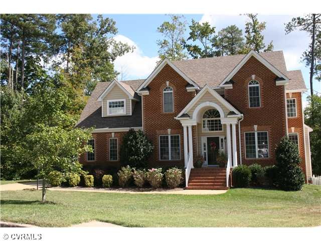 Exterior Front - Beautiful brick front home nestled on a lovely, landscaped, cul de sac lot with a very privarte, wooded rear.