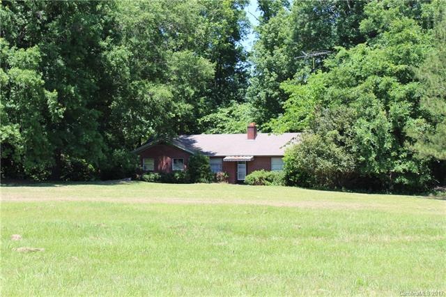 Front view from across this beautiful lawn.