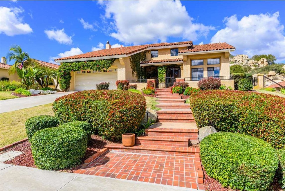 Expansive driveway, professionally landscaped and 