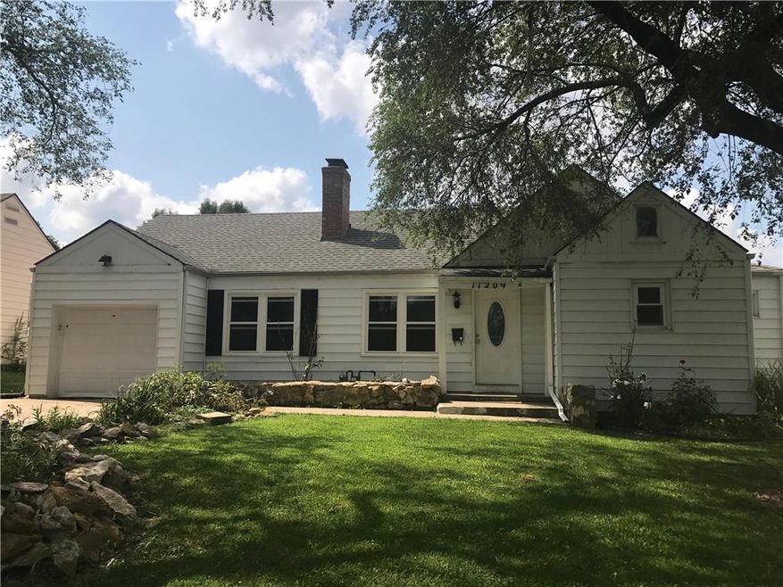 Nicely landscaped ranch home. Just a little TLC an