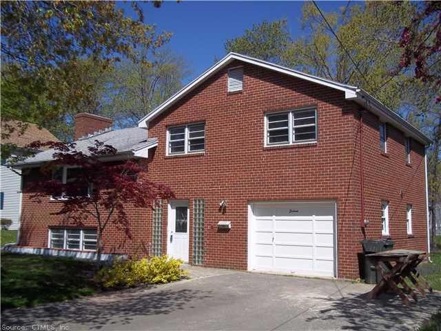 Exterior Front. SCULPTURED SOLID BRICK CONSTRUCTIO