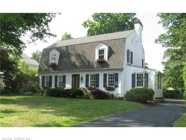Exterior Front. Storybook Dutch Colonial. This is 