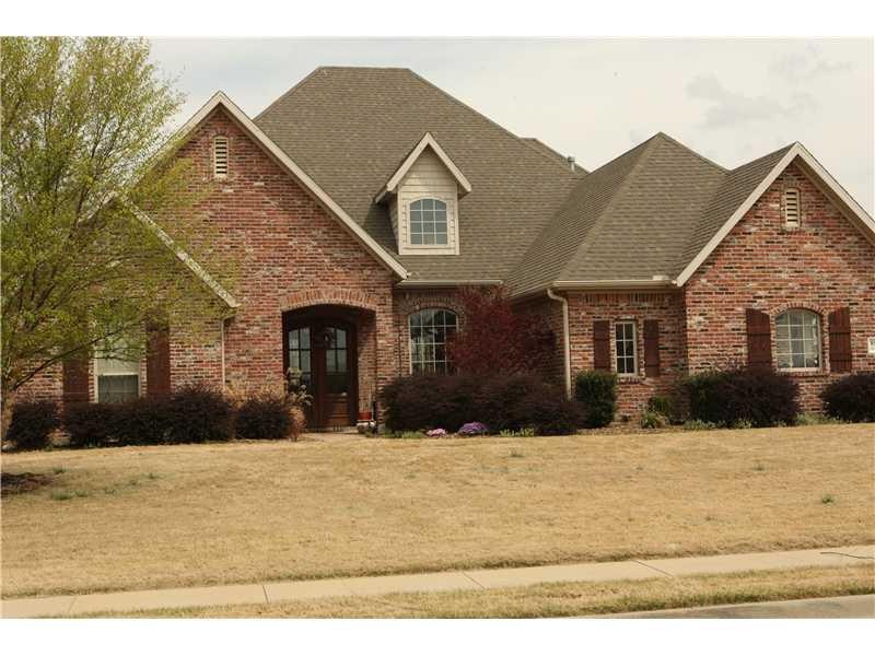 Exterior Front. Luxurious 1 level home located in Spring Ridge S/D on just under an acre!