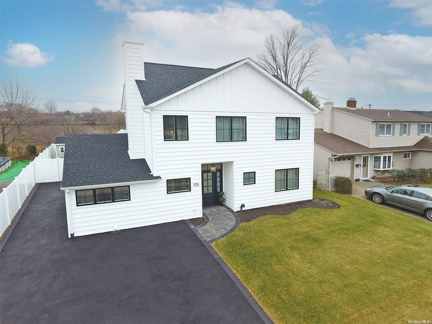 125 Springtime Ln W, Levittown, NY 11756 - photo 1