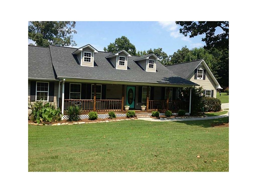 Exterior Front. New Landscaping