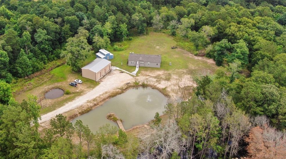 Look no further - Presenting 13877 Tommy Smith Road in Conroe.