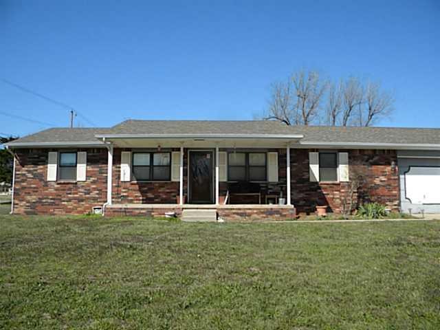 Exterior Front. Nice brick home with covered front
