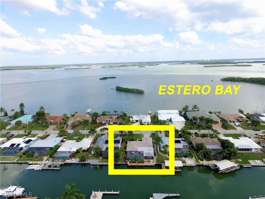 HOME IS JUST ONE CANAL BACK FROM ESTERO BAY.  FROM