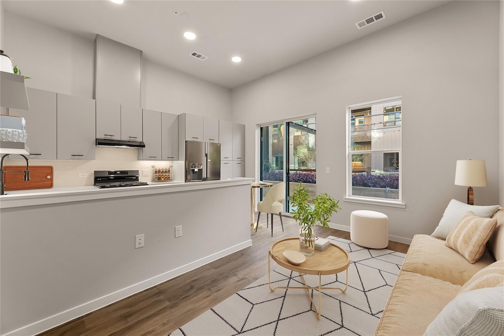 Living area featuring light wood-style floors and