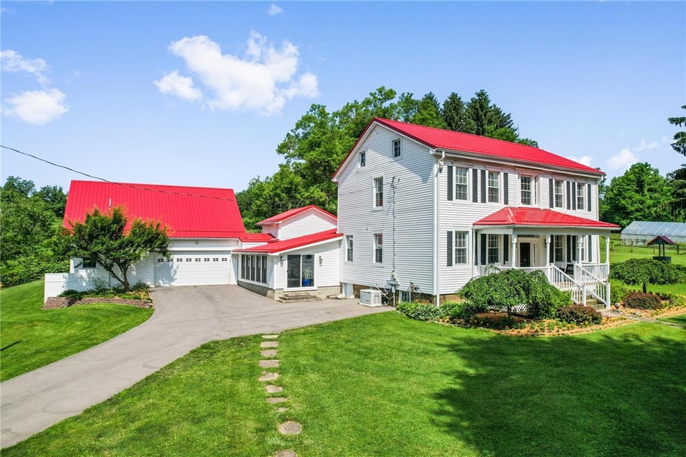 Welcome home to 397 Lee Road... your country oasis