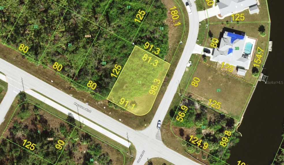 Oversized corner, across from waterfront properties.