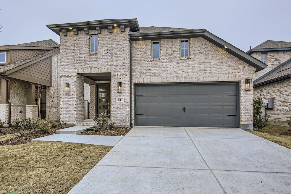 View of front of home with a garage