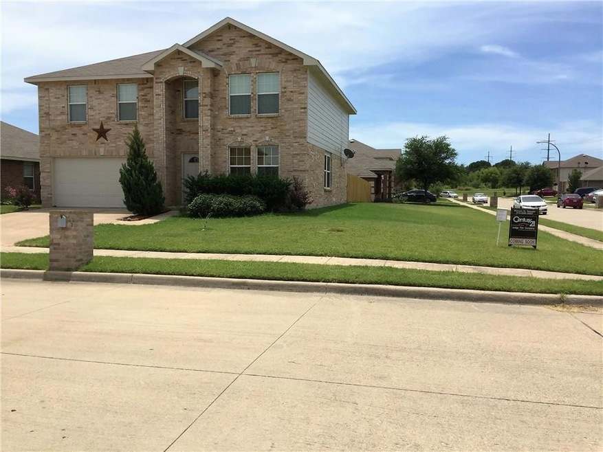 Front view. Corner Lot. New fence on street sides 
