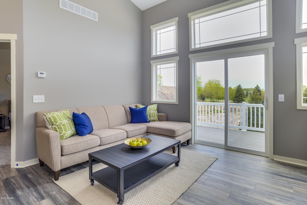 1209 Kingman Ct SW unit 55, Byron Center, MI 49315 - photo 1