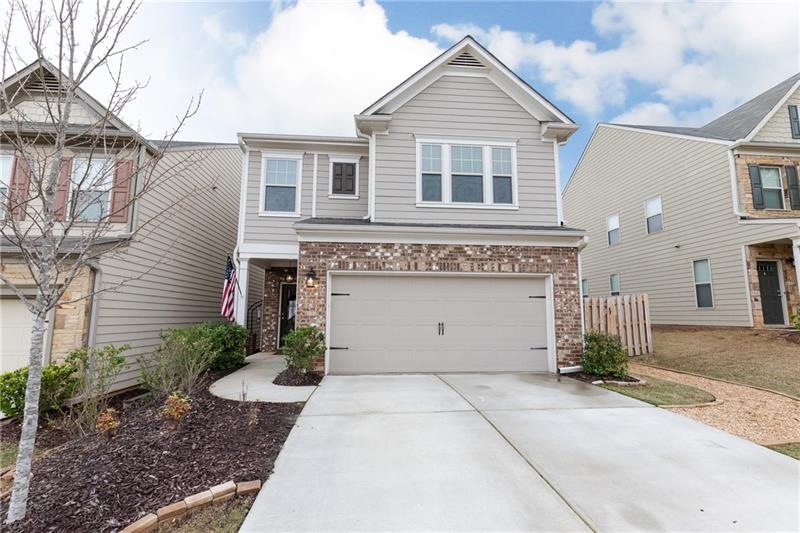 Front entry full 2 car garage plus additional park