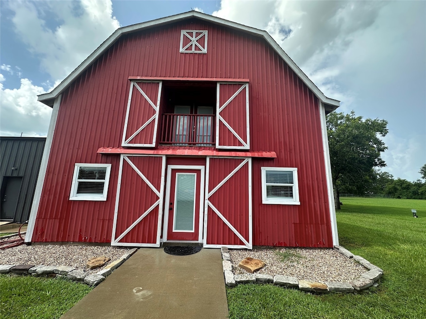 This red barn offers a unique blend of rustic char
