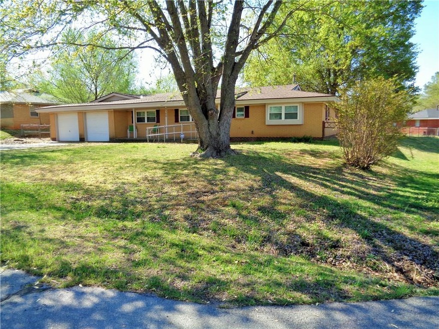 Corner lot with backyard access. 2 car garage!