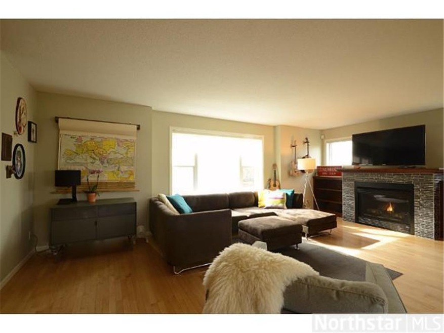 Warm and sunny Living Room. Hard wood floors, buil