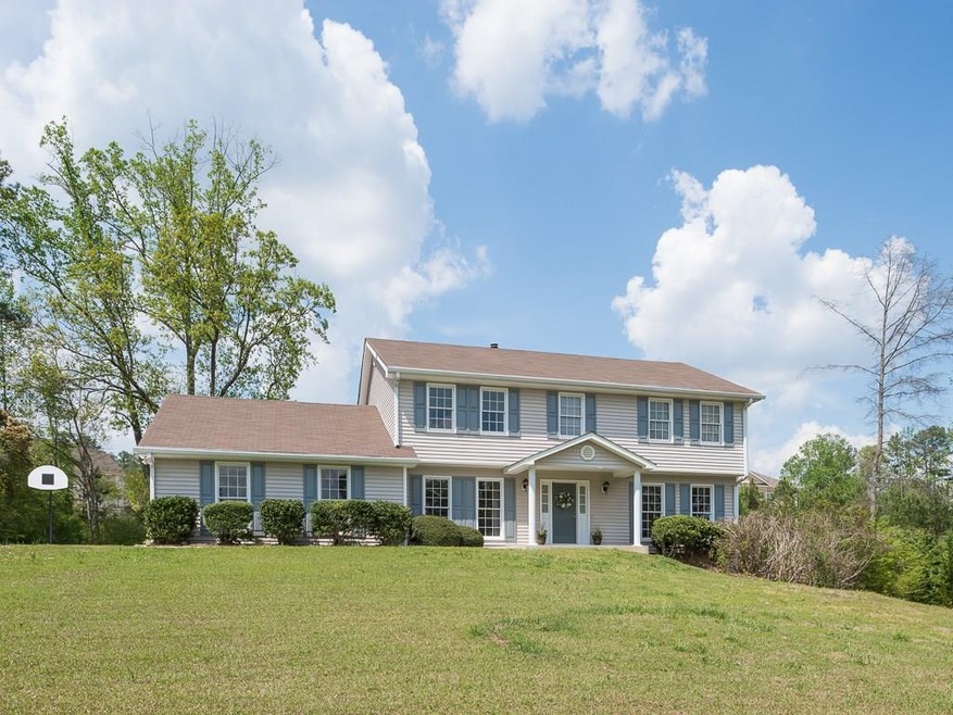 Front view on large level lot.