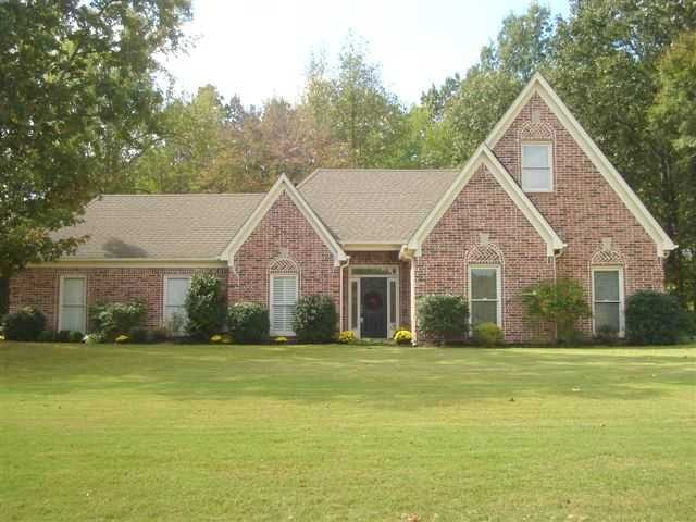 Beautiful custom brick on 1 acre