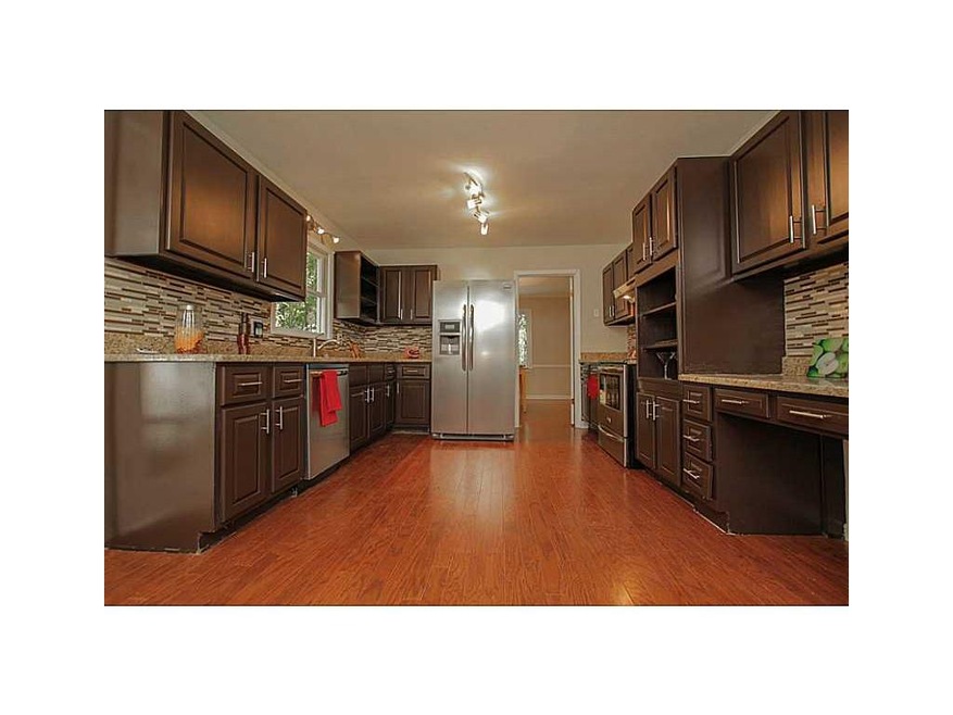Exterior Front. Stainless steel appliances against