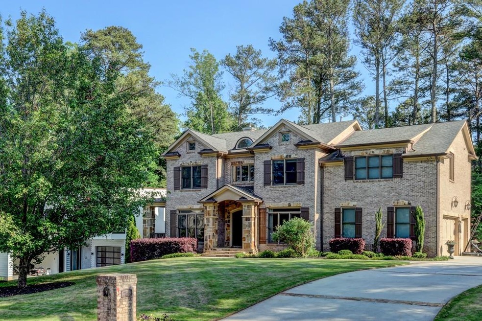 Stunning 4 sided brick & stone Milani custom built