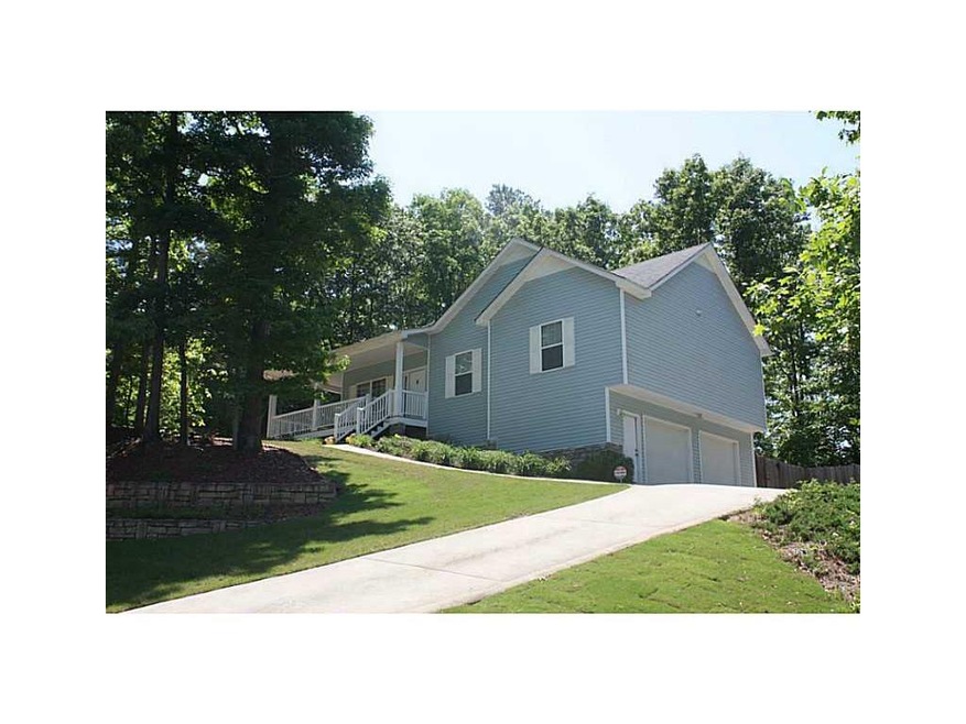 Exterior Front. Homes sits above the road with lar