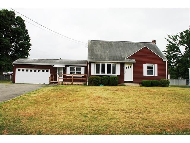 Exterior Front with nice level front lawn and with
