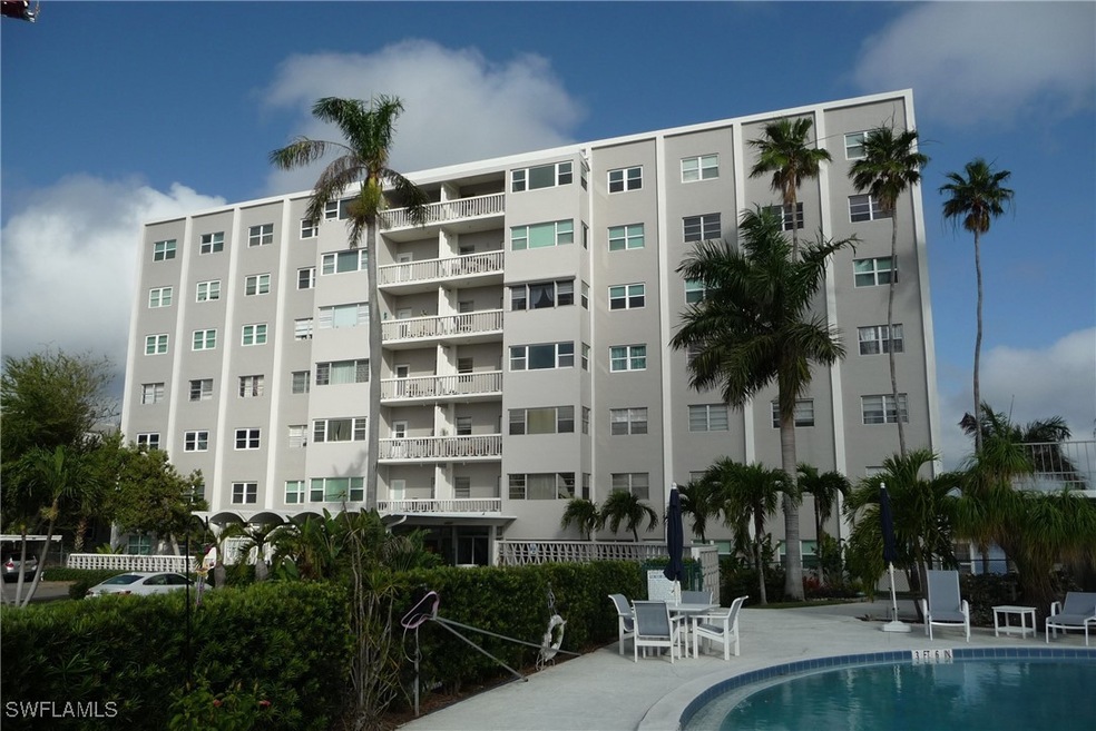 View of swimming pool with fence and a patio area