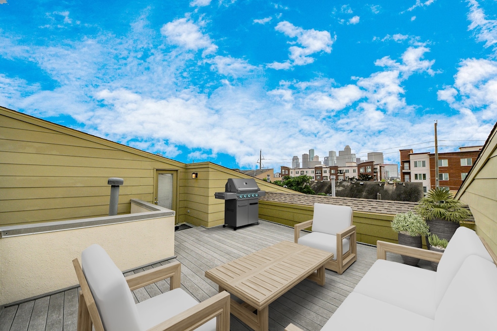 Experience a breathtaking fourth-floor outdoor oasis with water and gas hookups for perfect al fresco dining, all framed by stunning city skyline views.