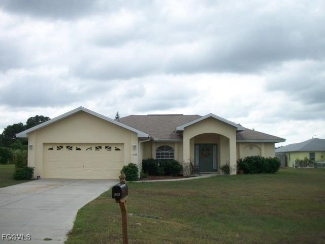 1633 Covington Meadows Cir, Lehigh Acres, FL 33936 - photo 1
