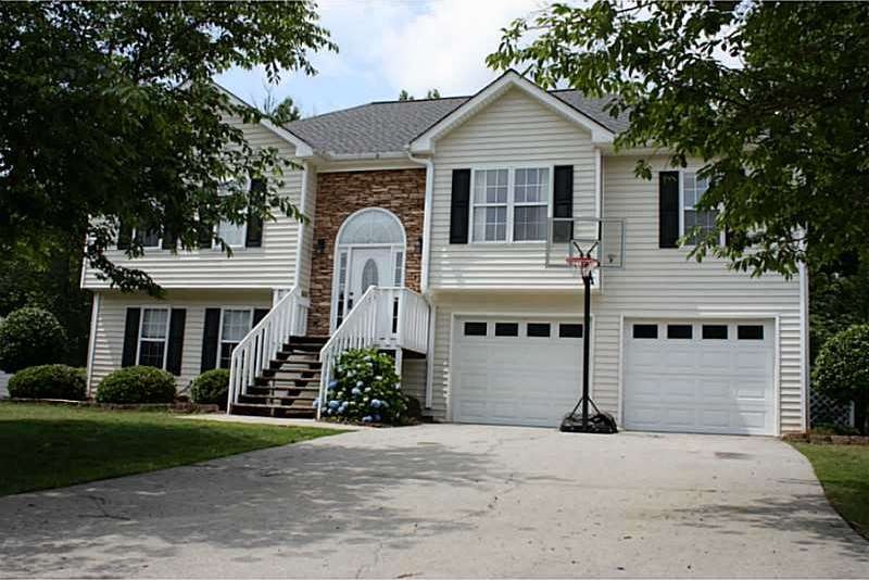 Exterior Front. Front view entrance and two car ga