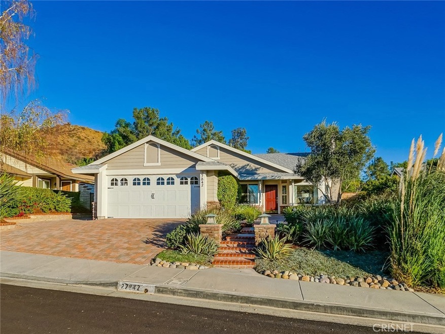 FRONT PHOTO LEADING TO PORCH AND FORMAL ENTRY.