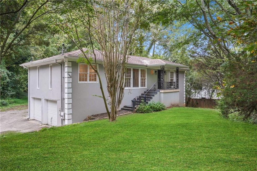 View of front of property with a front lawn and a 