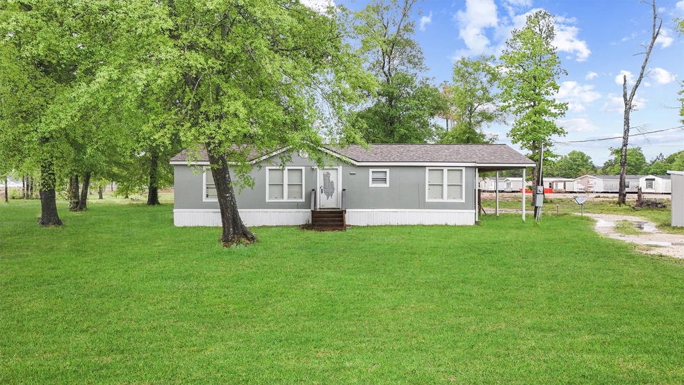 12180 Rebel Rd, Cleveland, TX 77327 - photo 1