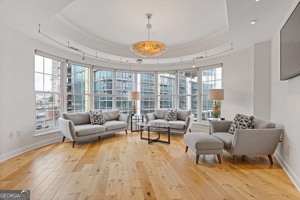 This is the showstopper for this condo, the floor to ceiling bowed window wall is absolutely stunning!