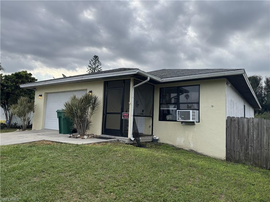 View of front of property featuring cooling unit, 