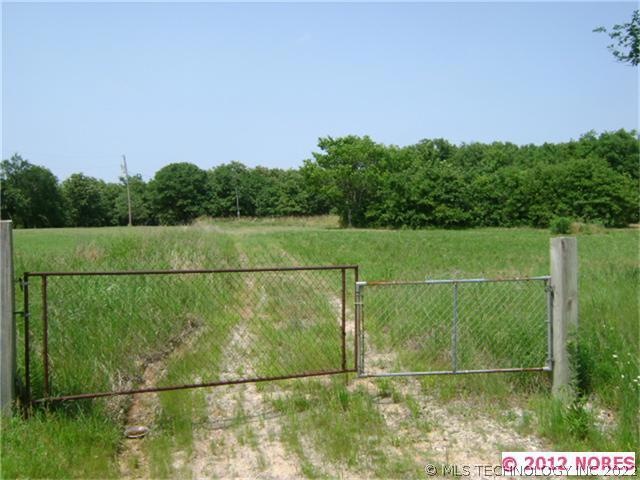 Gate is west of center of the frontage of the 10 a