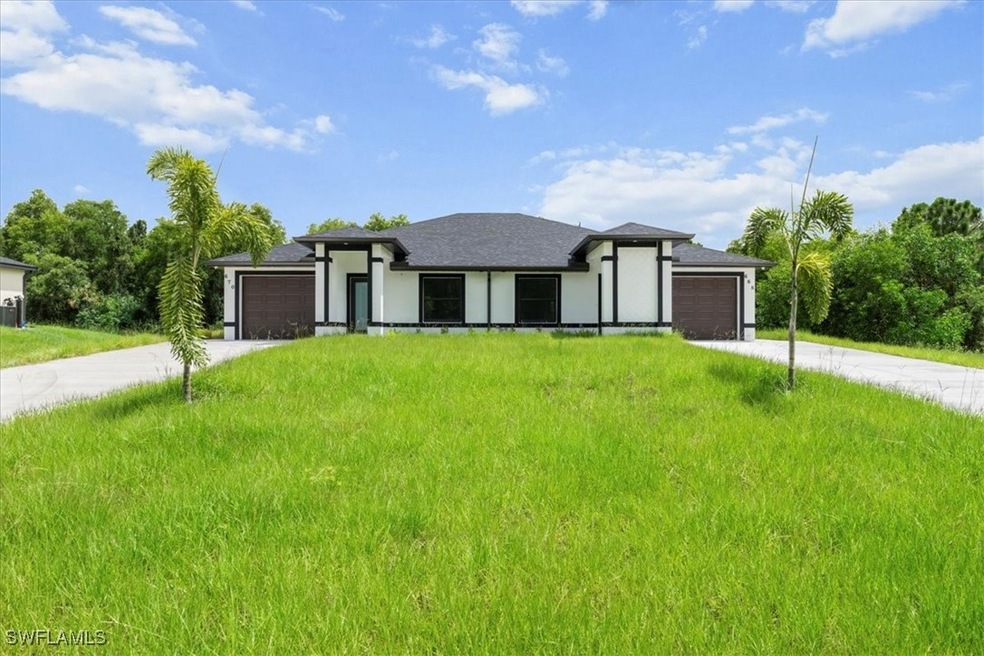 Prairie-style house featuring driveway, an attache
