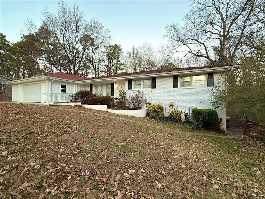 View of front of home with a front yard, a porch, 