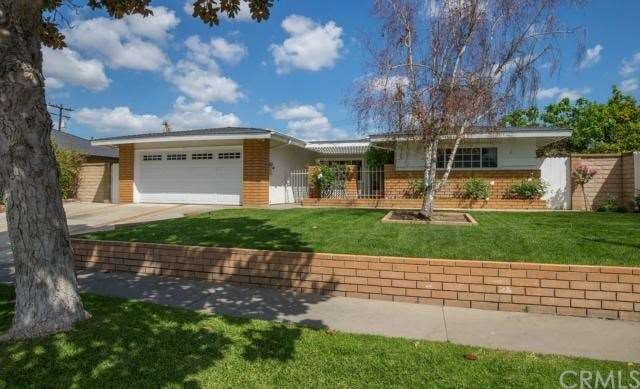 This meticulously maintained 4 bedroom home on a lovely tree-lined street offers irresistible curb appeal.  